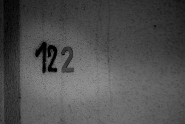 istock The number on the wall is one hundred twenty two or 122. 2146835750