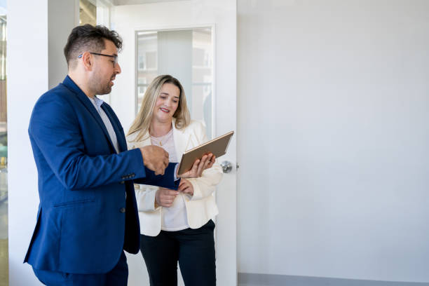 istock Professional consultant and a client interacting in the office 2146859930
