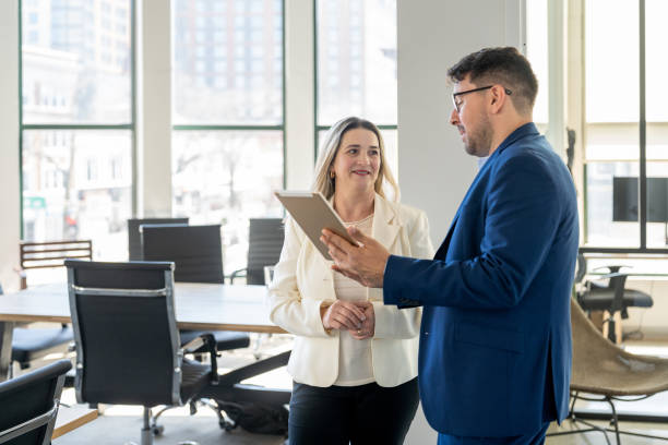 istock Professional consultant and a client interacting in the office 2146860440