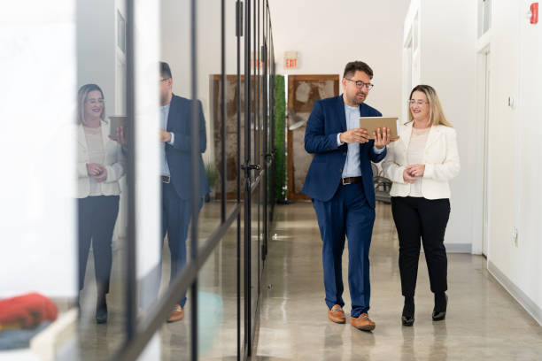 istock Professional consultant and a client interacting in the office 2146860475