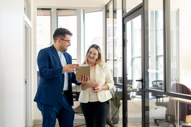istock Professional consultant and a client interacting in the office 2146860983