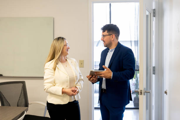 istock Professional consultant and a client interacting in the office 2146861000