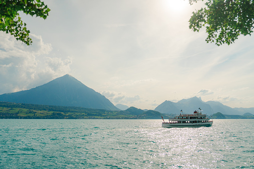 Scenic view of ferry  on Interlaken lake in Swiss Alps