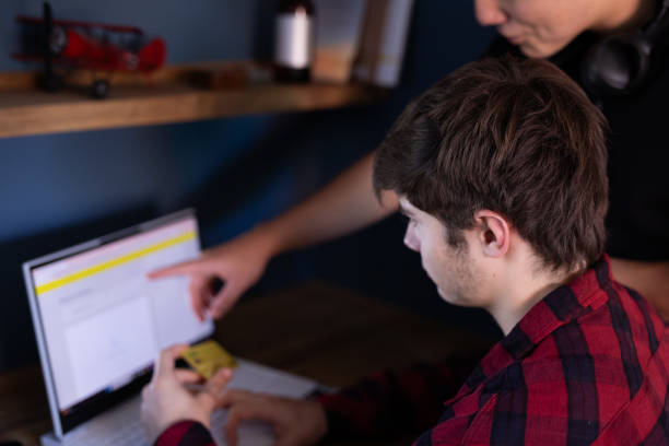 istock Two teenagers shopping online 2146901965