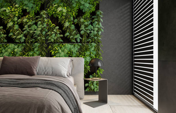 istock Modern minimalist bedroom with double bed and vertical garden on wall 2146930277