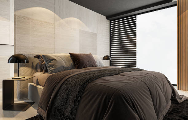 Modern bedroom. Daytime scene with white background. Double bed with brown and beige materials. Light beige texture stone walls and floor tiles. Scandinavian modern minimalist interior. 3d rendering.