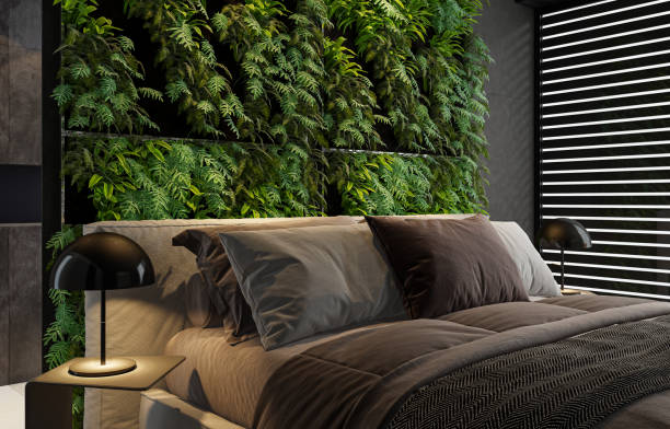 istock Modern minimalist bedroom with double bed and vertical garden on wall 2146942650