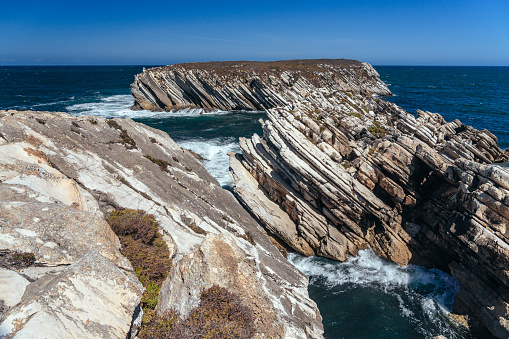 Beautiful cliffs and rock formations in the Baleal island, Peniche, Portugal, in a sunny day.