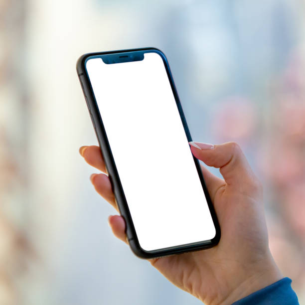 istock Digital Canvas: Woman's Hand Holding Smartphone with Blank Screen 2147034316