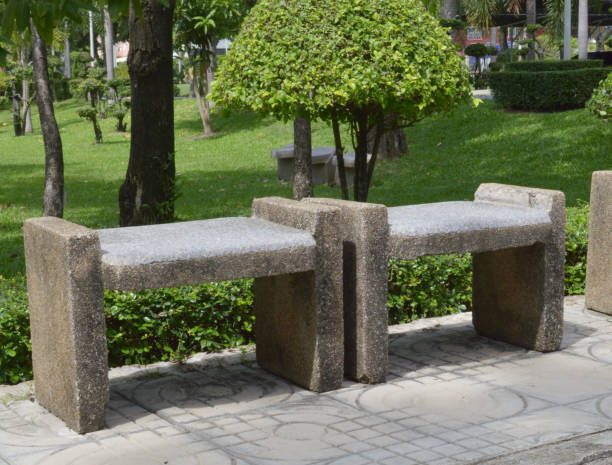 istock cement chair in garden 2147059582