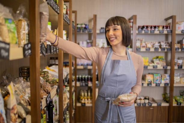 istock Smiling young female deli owner 2147082037