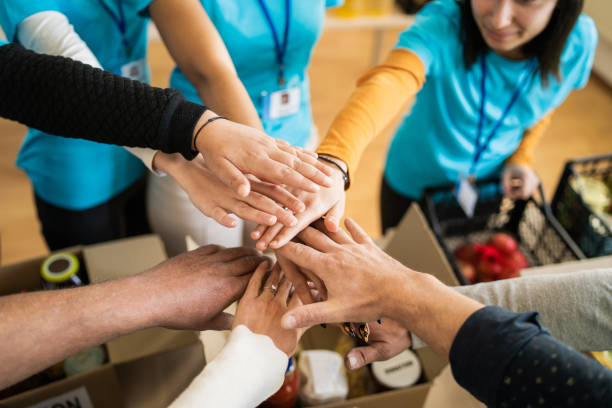 istock Hands stacked from a circle of arms 2147100061