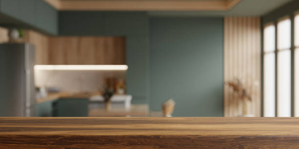 istock Wooden table top on blur kitchen room background,Modern Contemporary kitchen room interior 2147198499