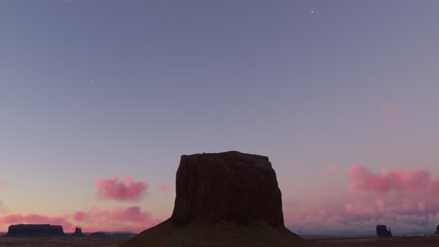 Aerial view at sunset of the desert in Monument Valley of Mitchell Butte in Arizona. United States