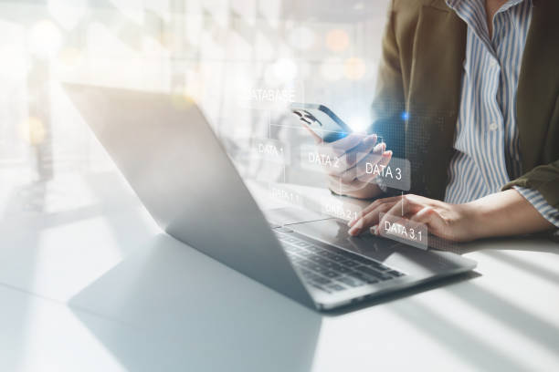 istock Individuals with document holograms in information system, archiving important documents in online databases to be accessed at any time, document database management. Storing document files on iCloud. 2147237242