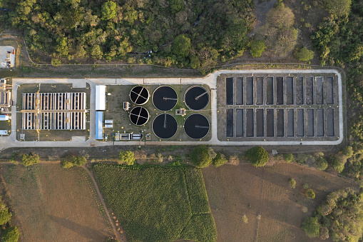 Recycled water plant factory tanks above top drone view