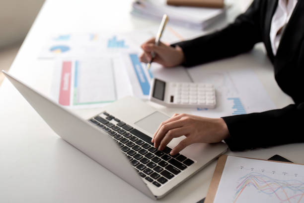 istock Documents, Business woman and accountant reading report for information, financial data or analysis. Paperwork, auditor check, review and bookkeeping, Calculate finance and tax in office 2147365078