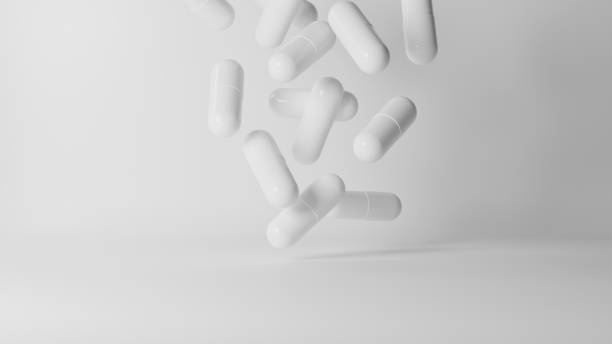 3D Illustration.Lots of white capsules on white background. Tablets.(horizontal)