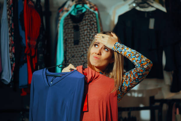 istock Stressed Woman Unable to Decide Between Garments 2147396402
