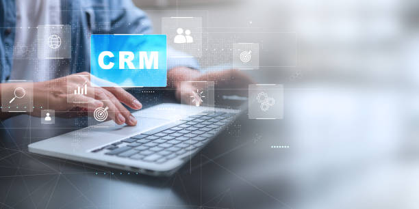 istock CRM - Customer Relationship Management. Businessman hold of global structure , Data exchanges development. customer service, social media, HR, digital marketing online. 2147427285