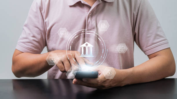 istock Finance and banking network concept. Businessman making payments and using mobile online banking  on the internet marketing. making retirement investments, purchasing stocks and mutual fund 2147449932