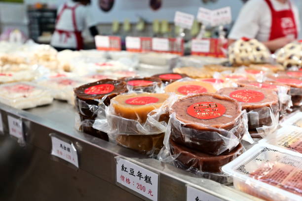 TW-01.18.24: Nian gao (rice cake), a Chinese New Year delicacy, is made by steaming glutinous or non-glutinous rice, offering a soft, chewy, and sweet texture, symbolizing prosperity and good fortune.