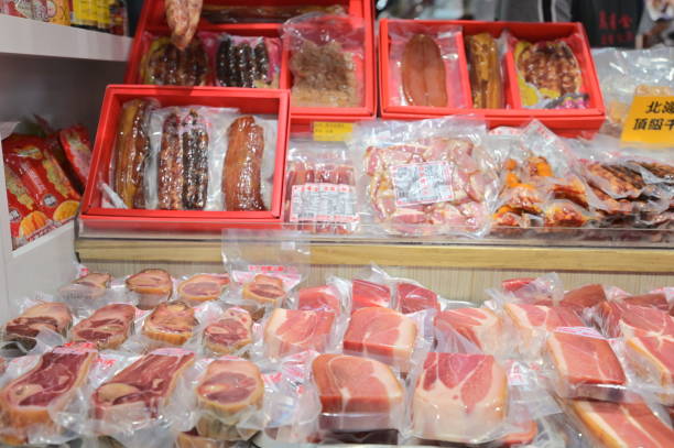 Taiwan - 01.18.24: The Taiwan market sells Taiwan-produced Jinhuaham, honey-glazed ham, sausage, and cured meats, vacuum-packed for convenience. They're essential ingredients for Chinese festivals.