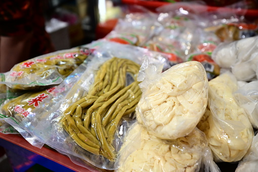 Taiwan-01.18.24: Suan jiang dou (酸豇豆), aka sour long beans or pickled long beans. This food is prepared by pickling and fermenting long beans, resulting in a delightful blend of flavors and textures.