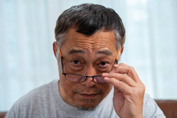 istock Senior Man Squinting Eyes and Take off put on glasses, Having Problems With Vision, Ophthalmic Issue, Bad Sight In Older Age, wearing eyeglasses posing against looking with wide opened eyes 2147484856