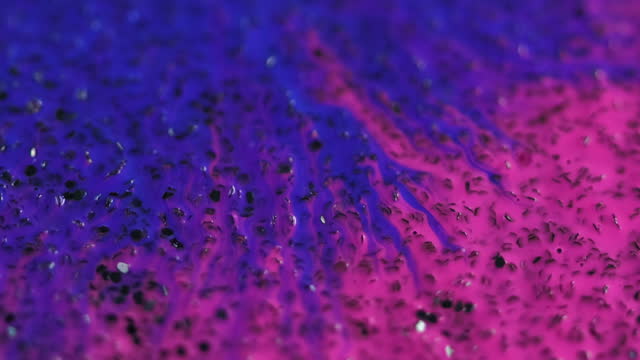 Ink spill paint blotch pink blue fluid splatter