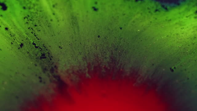 Paint splash ink drop color explosion green red