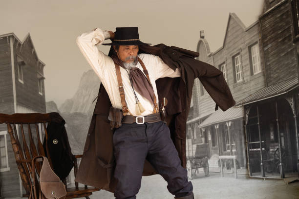 istock Sepia tone action cowboy portrait. 2147492390