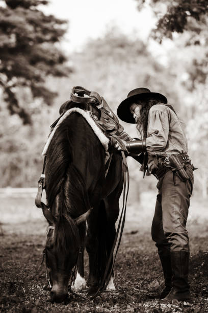 istock Sepia tone action cowboy portrait. 2147492404