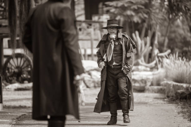 istock Sepia tone action cowboy portrait. 2147492467