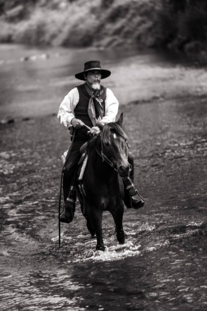 istock Sepia tone action cowboy portrait. 2147492474