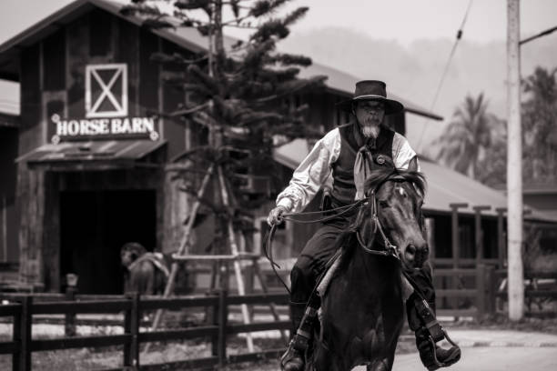 istock Sepia tone action cowboy portrait. 2147492494