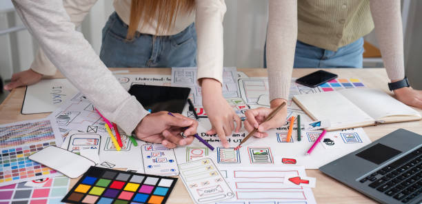 Brainstorming session for the creative team of designers in application design and implementation planning ux/ui Teamwork of modern business teams