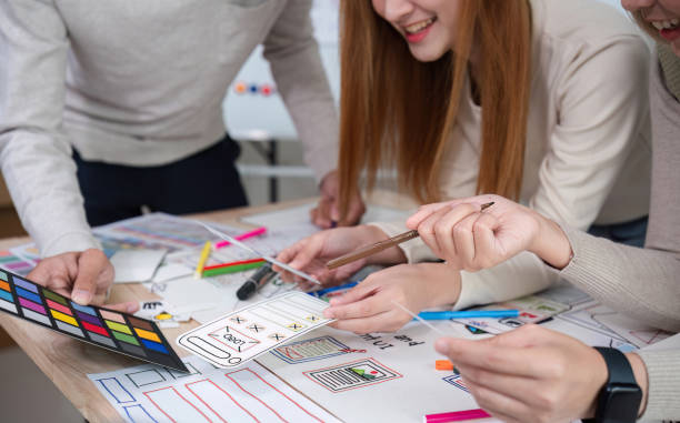 istock Brainstorming session for the creative team of designers in application design and implementation planning ux/ui Teamwork of modern business teams 2147493436