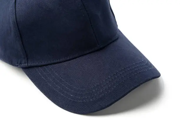 Photo of Navy Blue Baseball Cap on a White Background With Clear Lighting