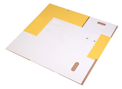 Foldable cardboard box used for storage moving or shipping purposes isolated on a white background