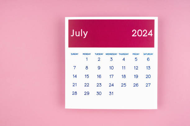 istock Calendar page July 2024 on pink background. 2147496671