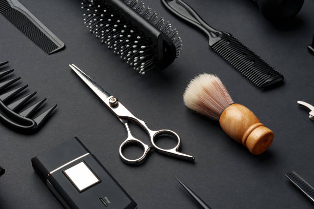 istock Variety of Hair Styling Tools and Accessories Displayed on a Dark Background 2147497783