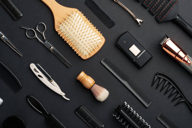 istock Variety of Hair Styling Tools and Accessories Displayed on a Dark Background 2147497908