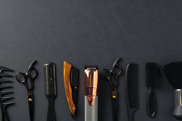 istock An Assortment of Professional Hairdressing Tools Laid Out on a Dark Surface 2147498422