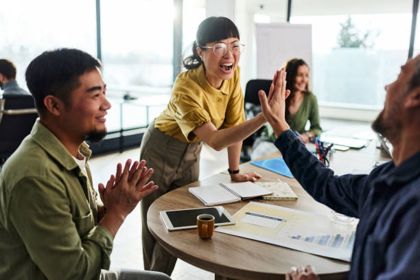 istock Give me high-five colleague! 2147499455