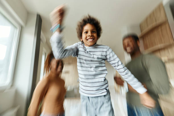 istock Fun at moving house in blurred motion! 2147500592