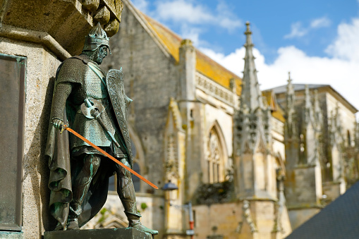 The sculpture of Richard I (Richard the Fearless) stands in a square in Falaise. It is one of six sculptures (six ducal predecessors) at the foot of the statue of William the Conqueror. The bronze was designed by Louis Rochet and completed in 1875.