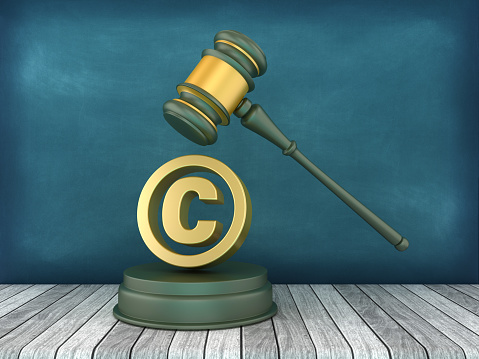 Legal Gavel with Copyright Symbol - Chalkboard Background - 3D Rendering