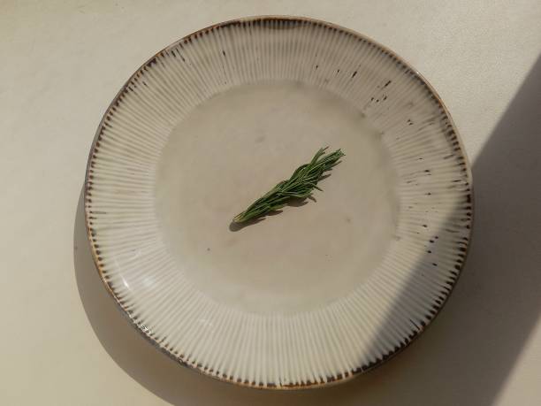 istock A rosemary branch on a plate 2147502817
