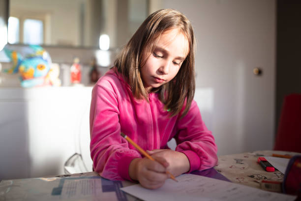 istock Various expression of a little girl studying. 2147506112